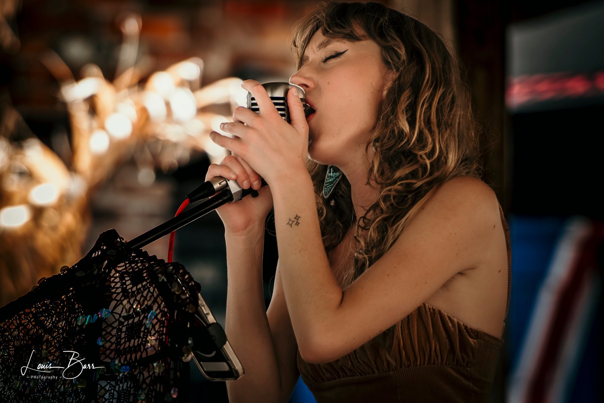 Saylor performing live